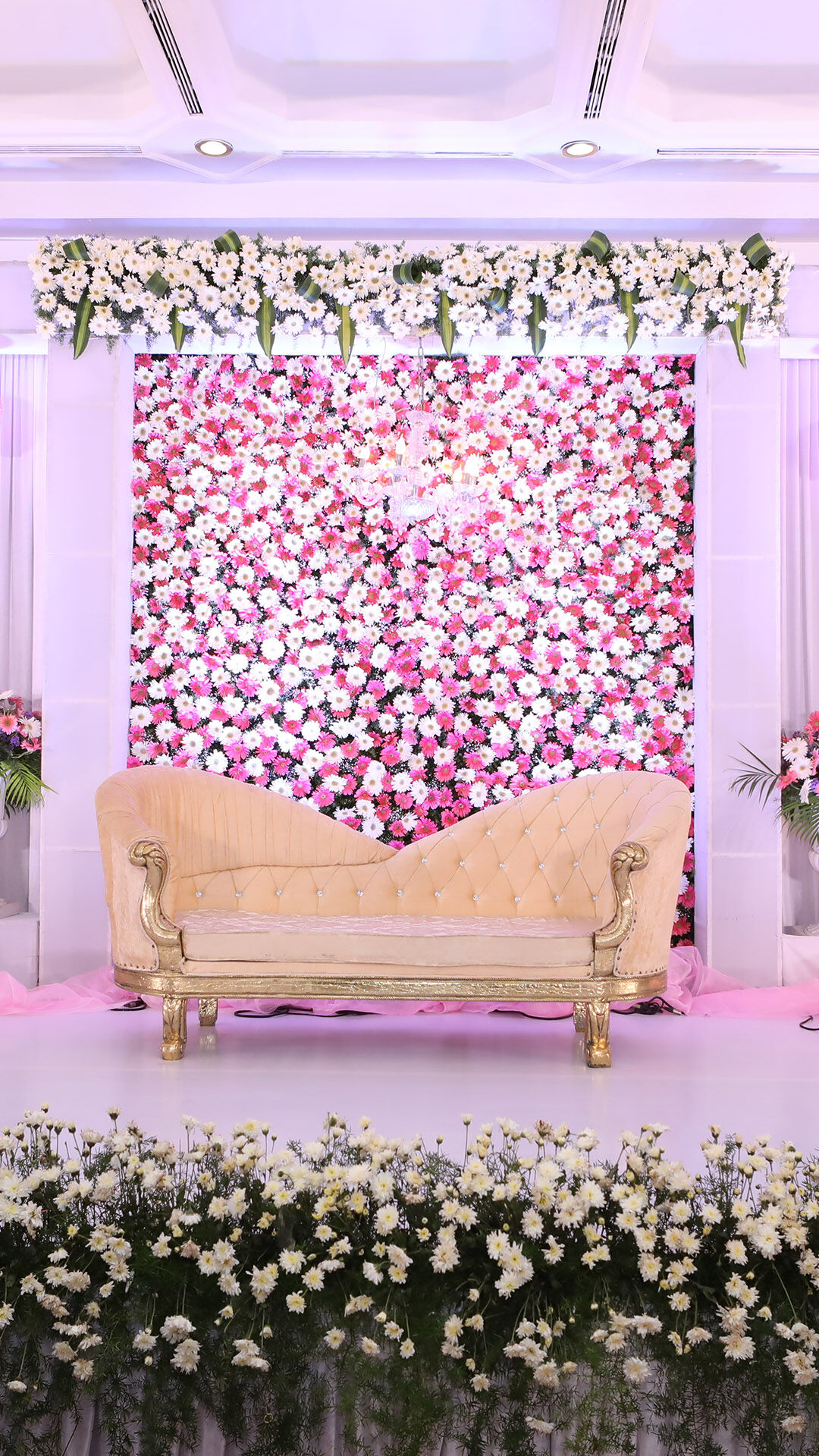 Elegant pink and white theme wedding reception theme with white and pink flowers
